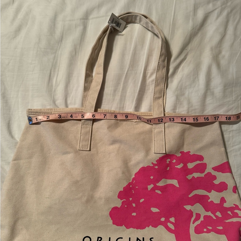 Origins Cream Tote with Pink Tree Design. New with tags